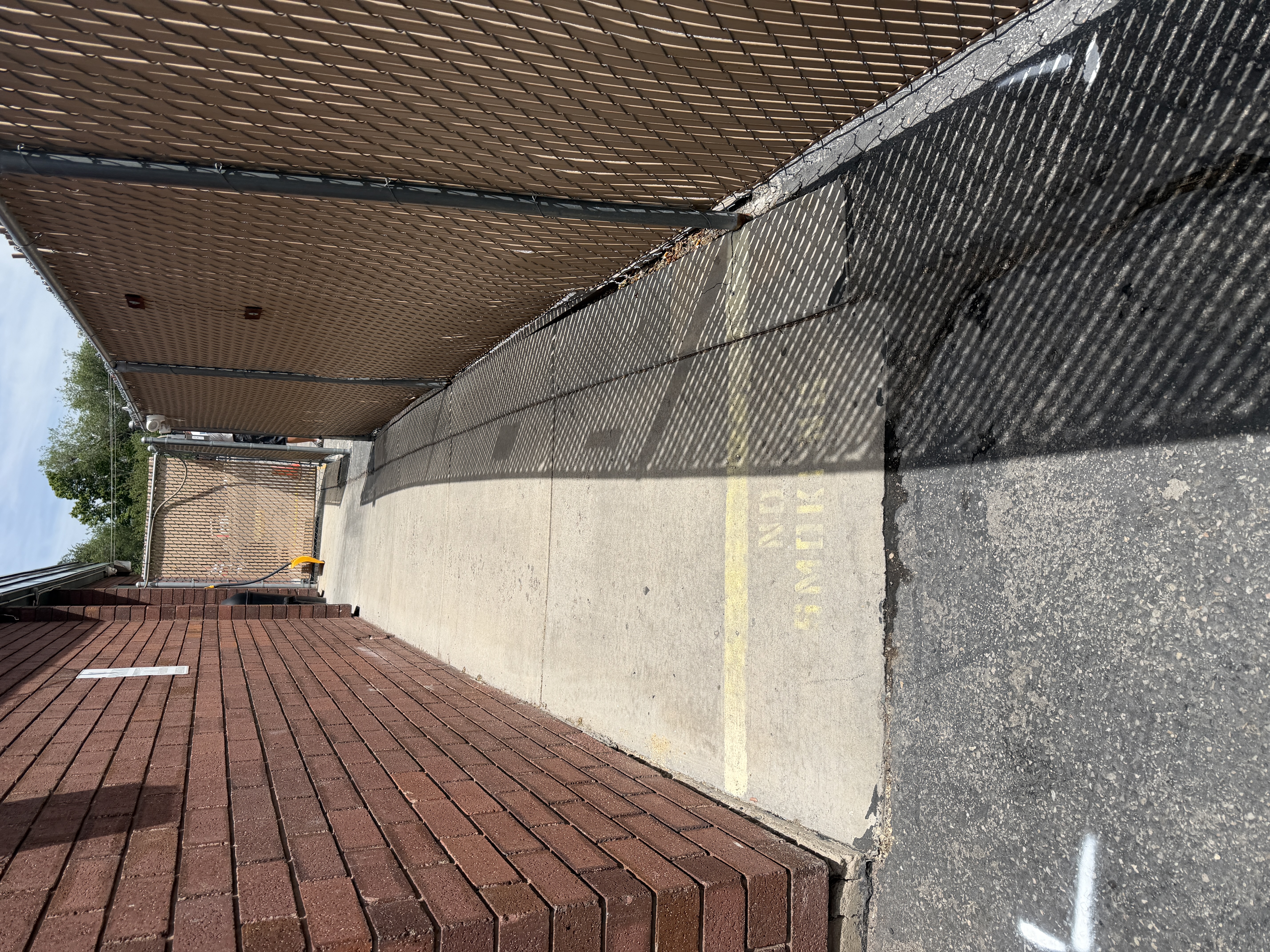 Existing fence before Spacemakers Fence replaced it in Salt Lake City, Utah